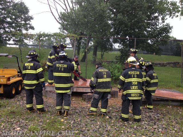 Probationary Firefighters Performing Roof Ventilation Training At Westchester County Fire Training Center On 7/15/14